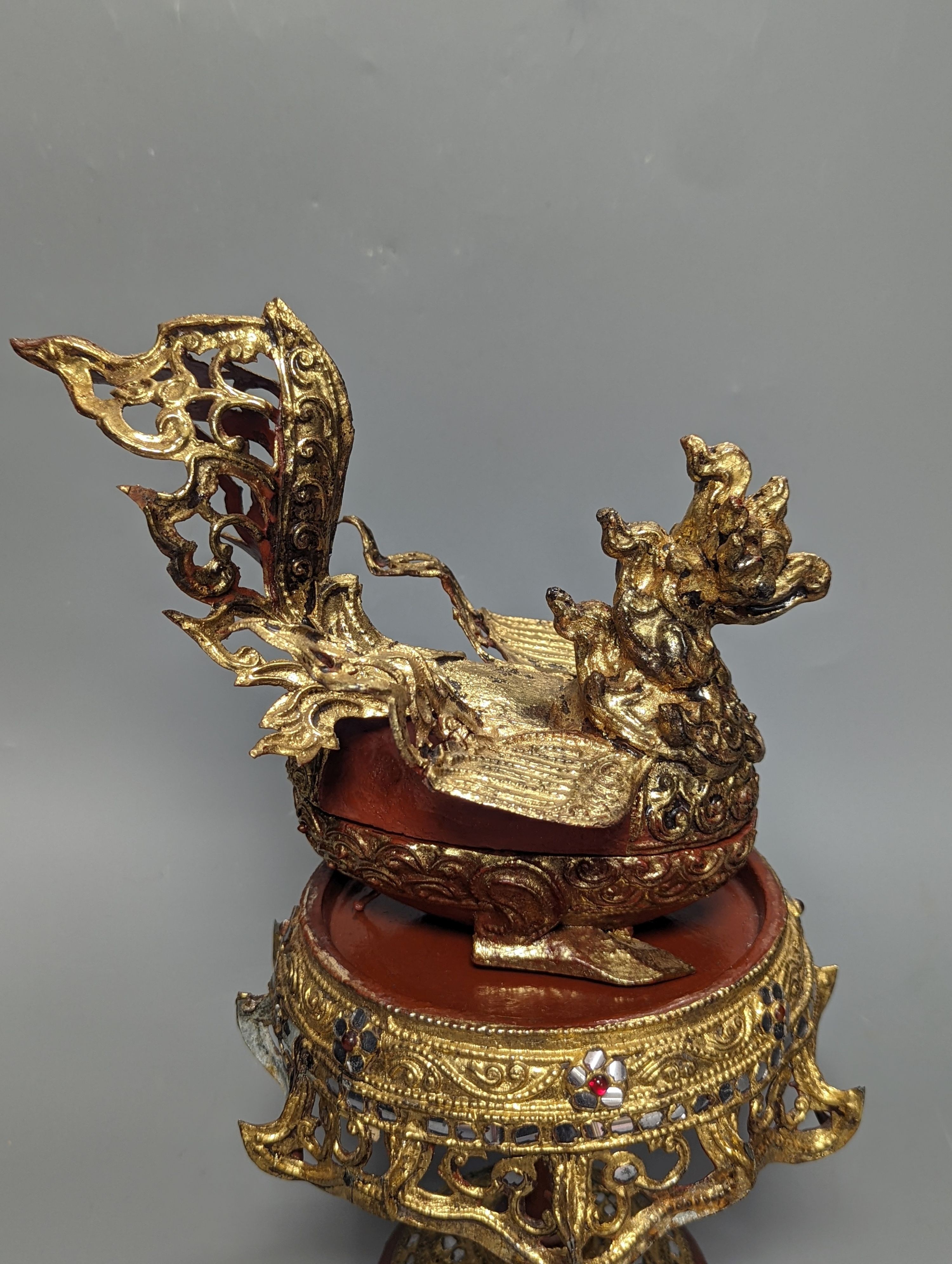 A Burmese painted gilt decorated metal, wood and composition ‘phoenix’ Betel box, total height 32cm